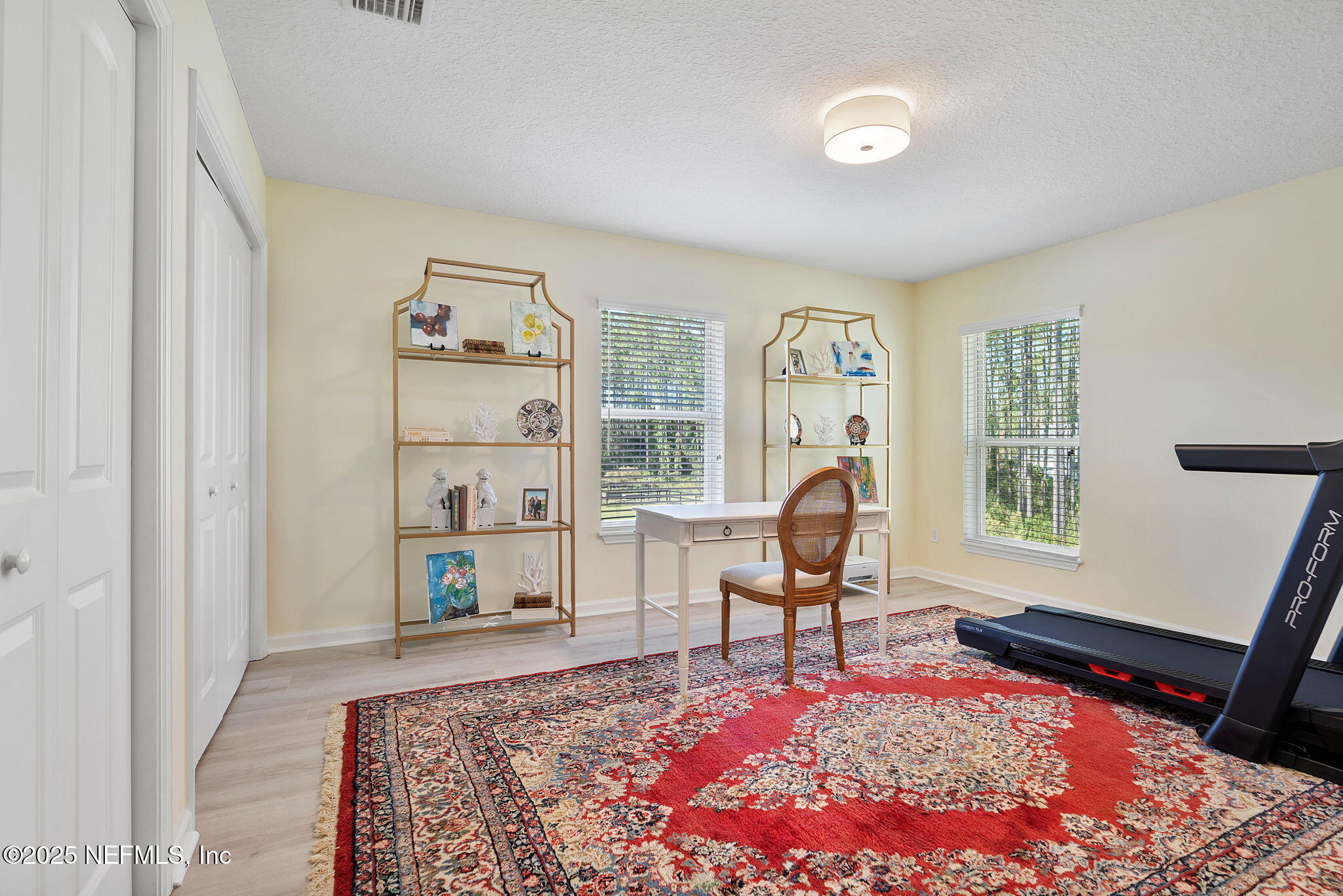 139 Foxcraft Street St. Augustine, FL 32092 - Photo 51 of 93 a living room with furniture a rug and a window