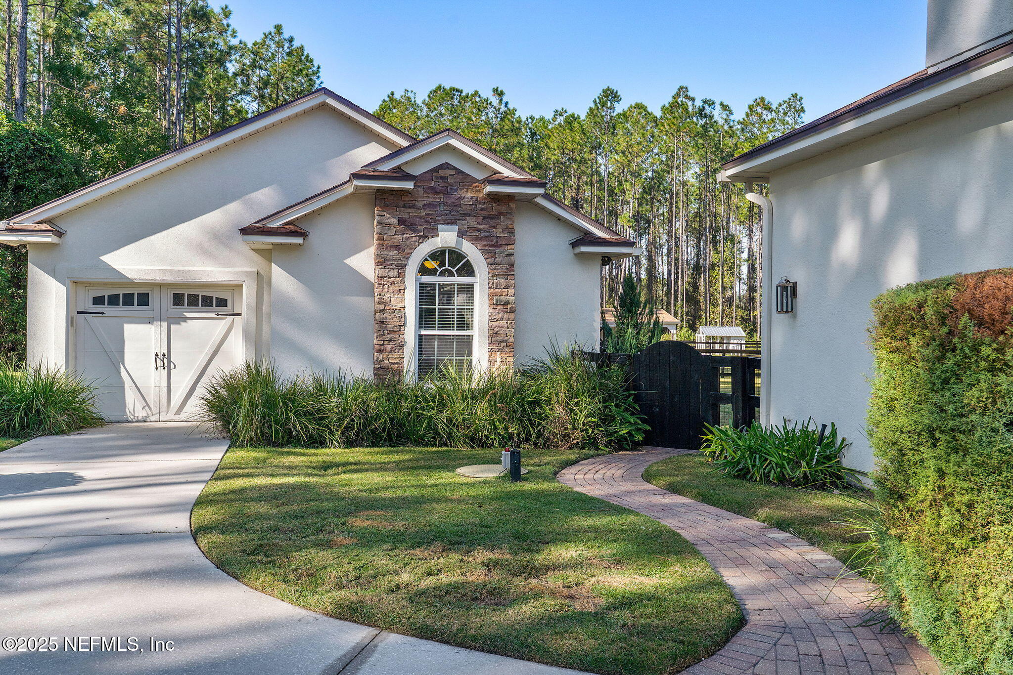 139 Foxcraft Street St. Augustine, FL 32092 - Photo 62 of 93 a front view of a house with a yard