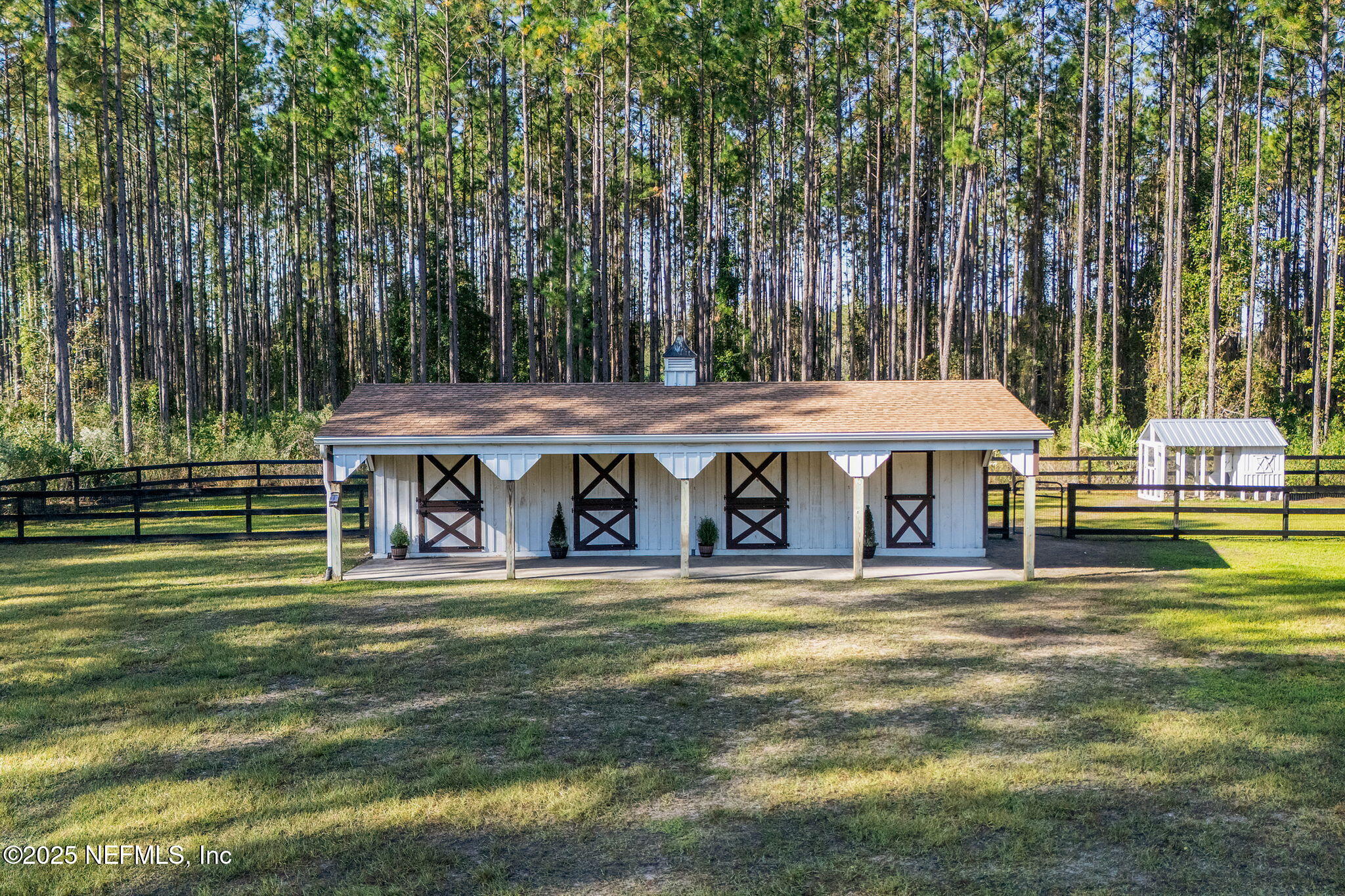 139 Foxcraft Street St. Augustine, FL 32092 - Photo 77 of 93 a view of a house with a yard table and chairs in patio