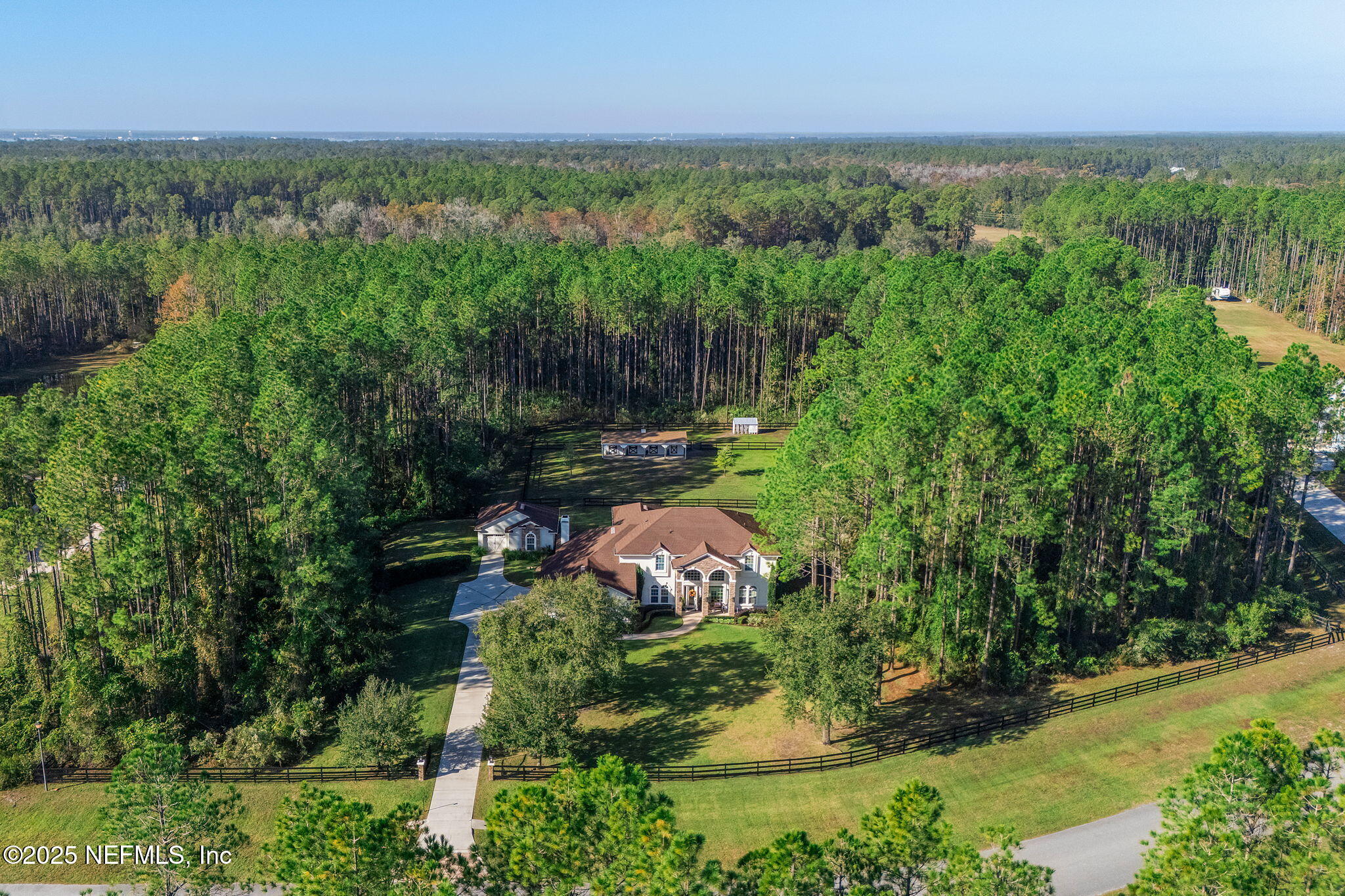 139 Foxcraft Street St. Augustine, FL 32092 - Photo 84 of 93 an aerial view of a city with lots of residential buildings and mountain view in back