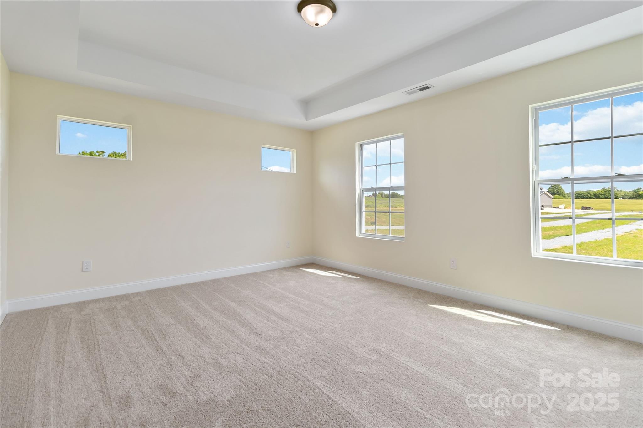 1034 Heath Helms Road Monroe, NC 28110 - Photo 16 of 30 an empty room with windows