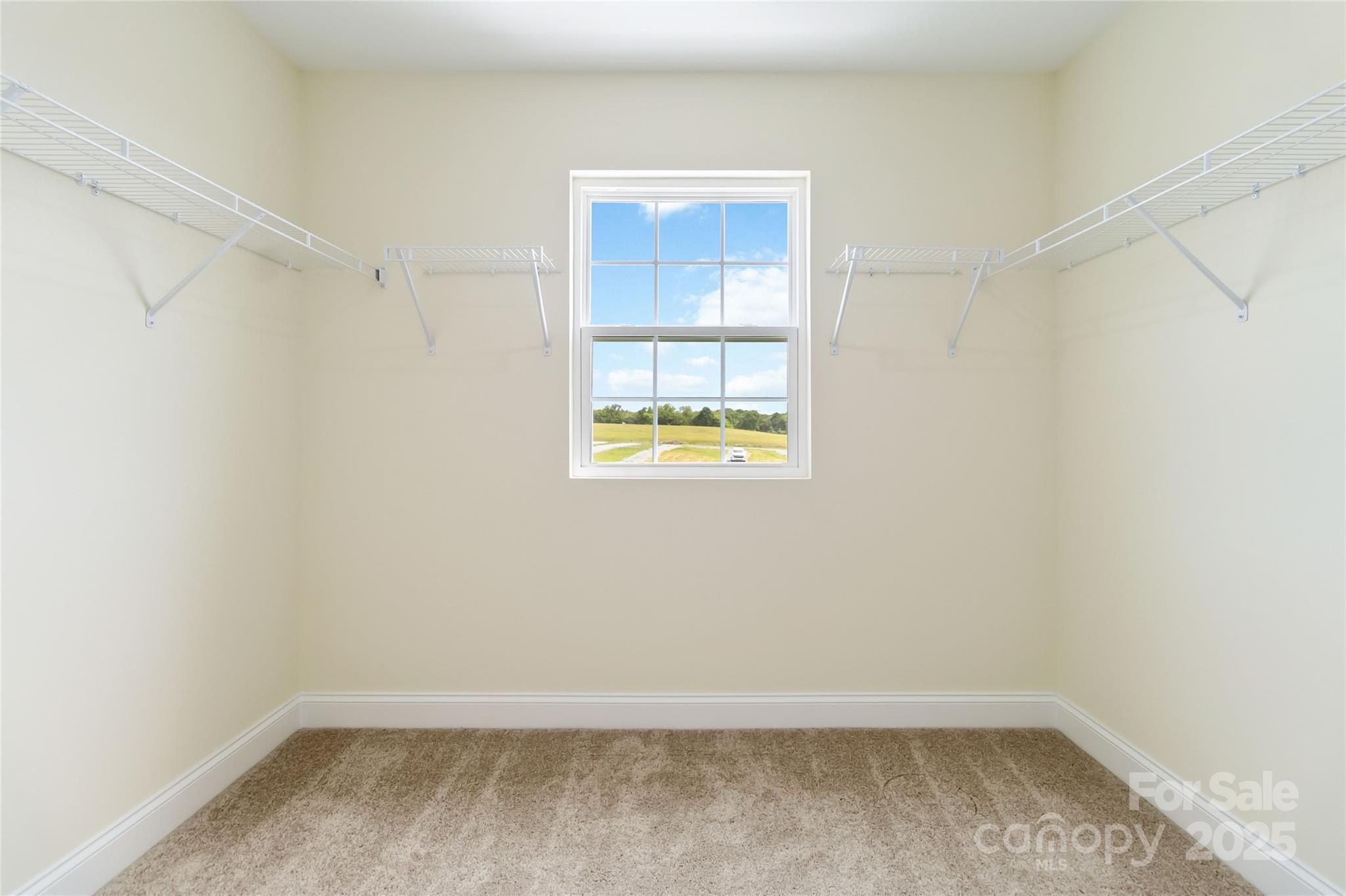 1034 Heath Helms Road Monroe, NC 28110 - Photo 17 of 30 an empty room with a window