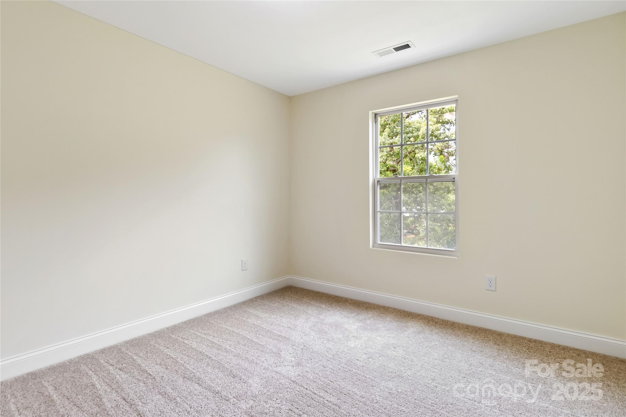 1034 Heath Helms Road Monroe, NC 28110 - Photo 22 of 30 an empty room with a window