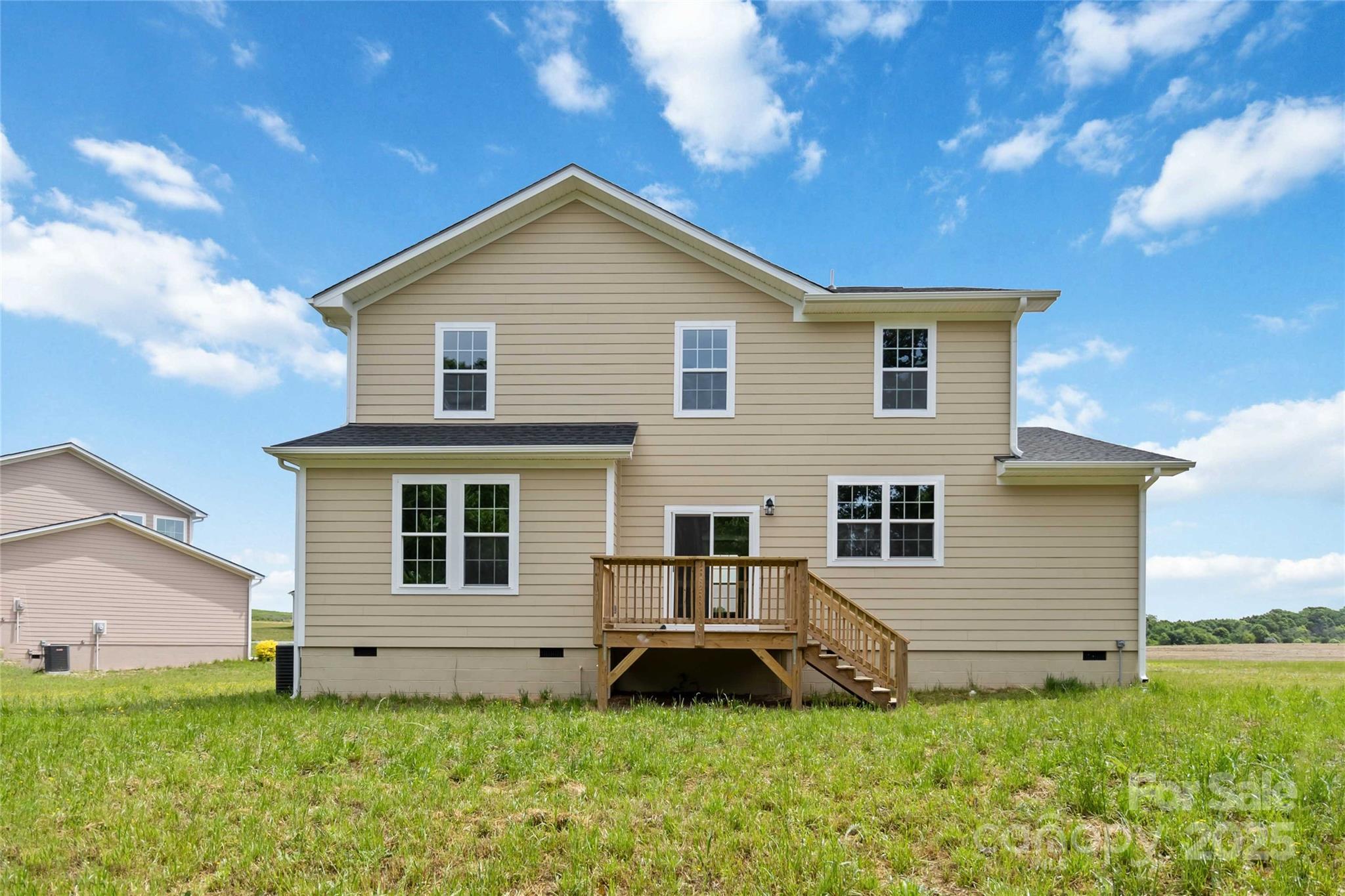 1034 Heath Helms Road Monroe, NC 28110 - Photo 28 of 30 a view of a house with a yard
