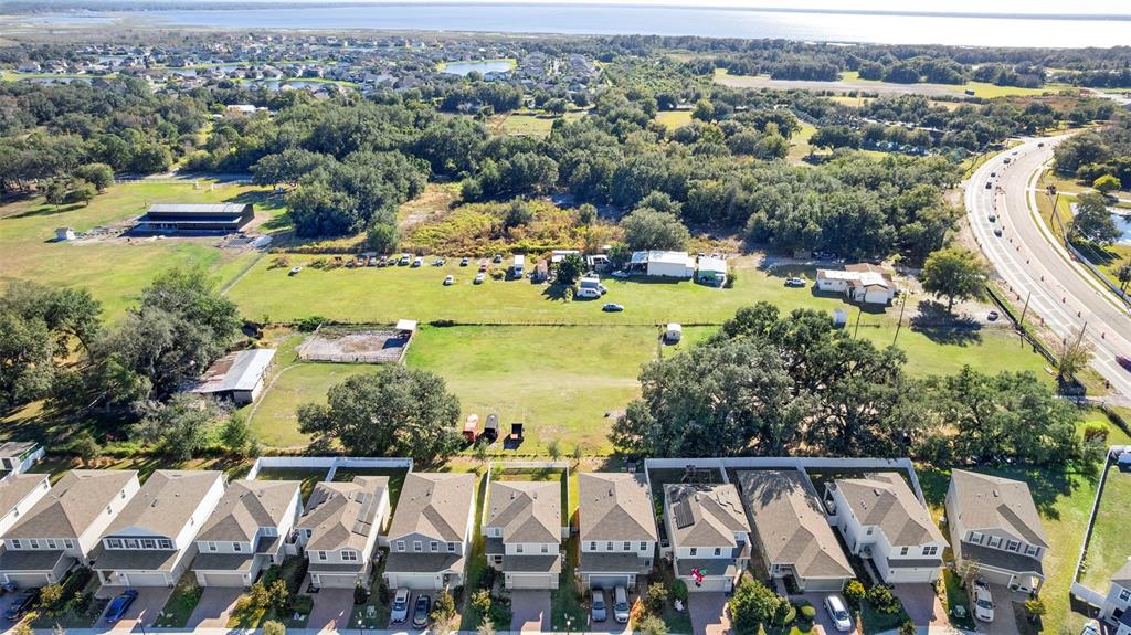 4320 Boggy Creek Road Kissimmee, FL 34744 - Photo 18 of 24 an aerial view of residential houses with outdoor space