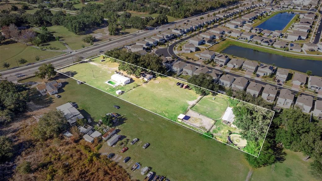 4320 Boggy Creek Road Kissimmee, FL 34744 - Photo 2 of 24 an aerial view of a city