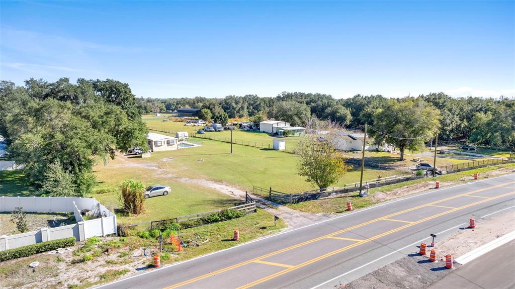 4320 Boggy Creek Road Kissimmee, FL 34744 - Photo 4 of 24 a view of a swimming pool with a patio