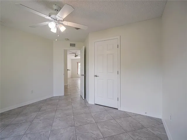 an empty room with a bathroom