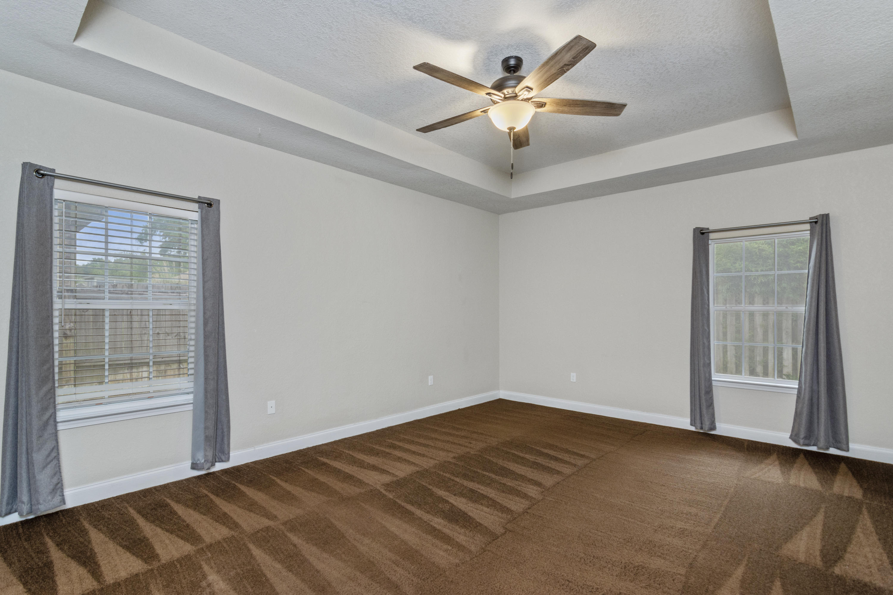 4610 Hermosa Road Crestview, FL 32539 - Photo 14 of 35 a view of an empty room with a window