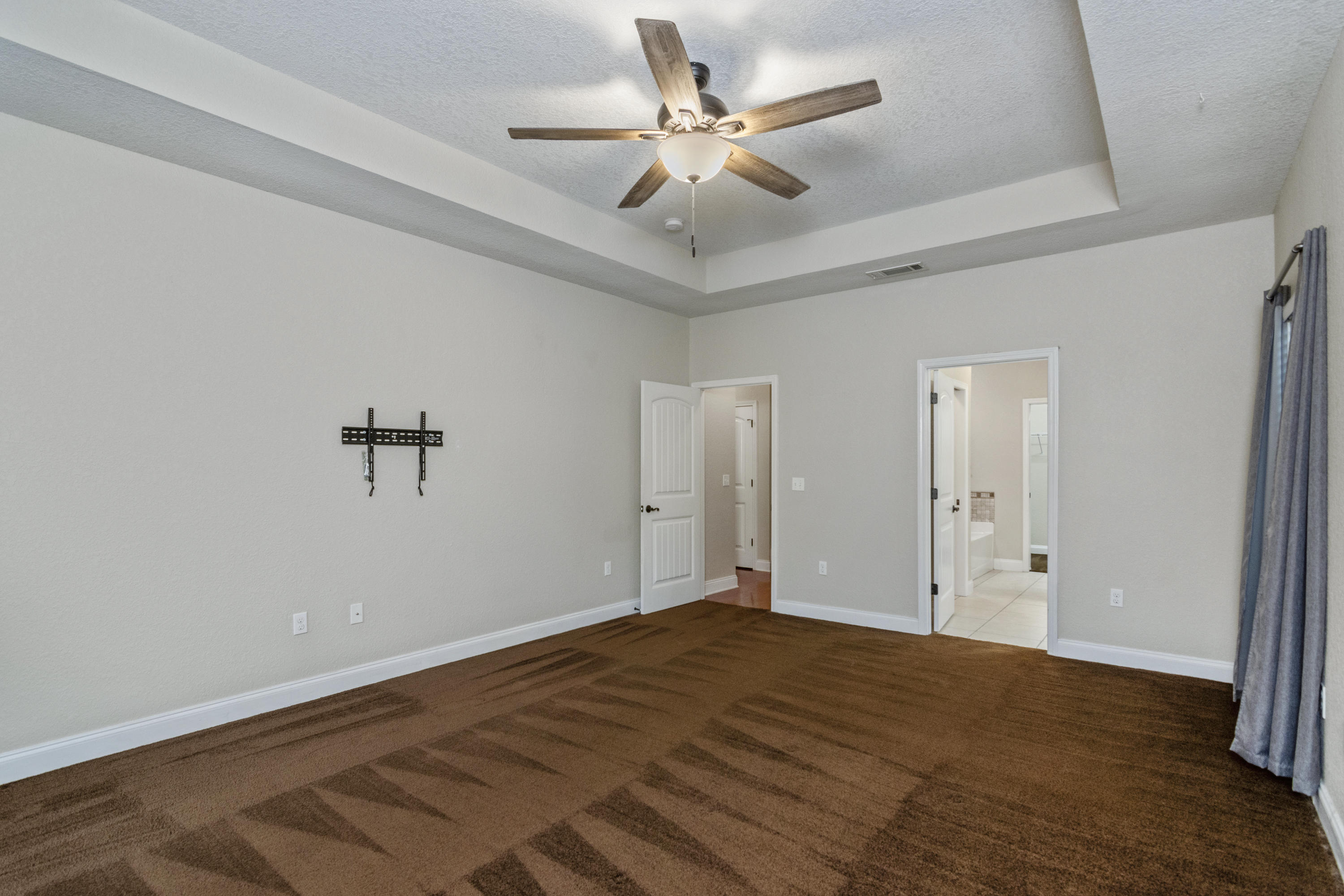 4610 Hermosa Road Crestview, FL 32539 - Photo 15 of 35 a view of empty room with wooden floor
