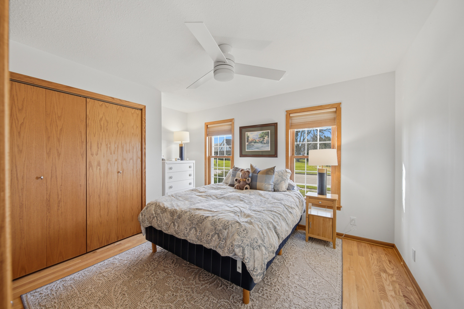 1101 Northridge Dixon, IL 61021 - Photo 22 of 45 a bedroom with a large bed and a chandelier