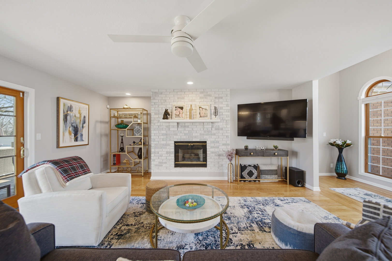 1101 Northridge Dixon, IL 61021 - Photo 4 of 45 a living room with furniture a flat screen tv and a fireplace