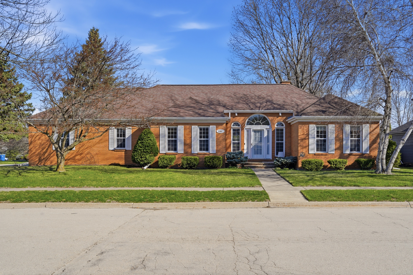 1101 Northridge Dixon, IL 61021 - Photo 43 of 45 a front view of a house with a yard and trees
