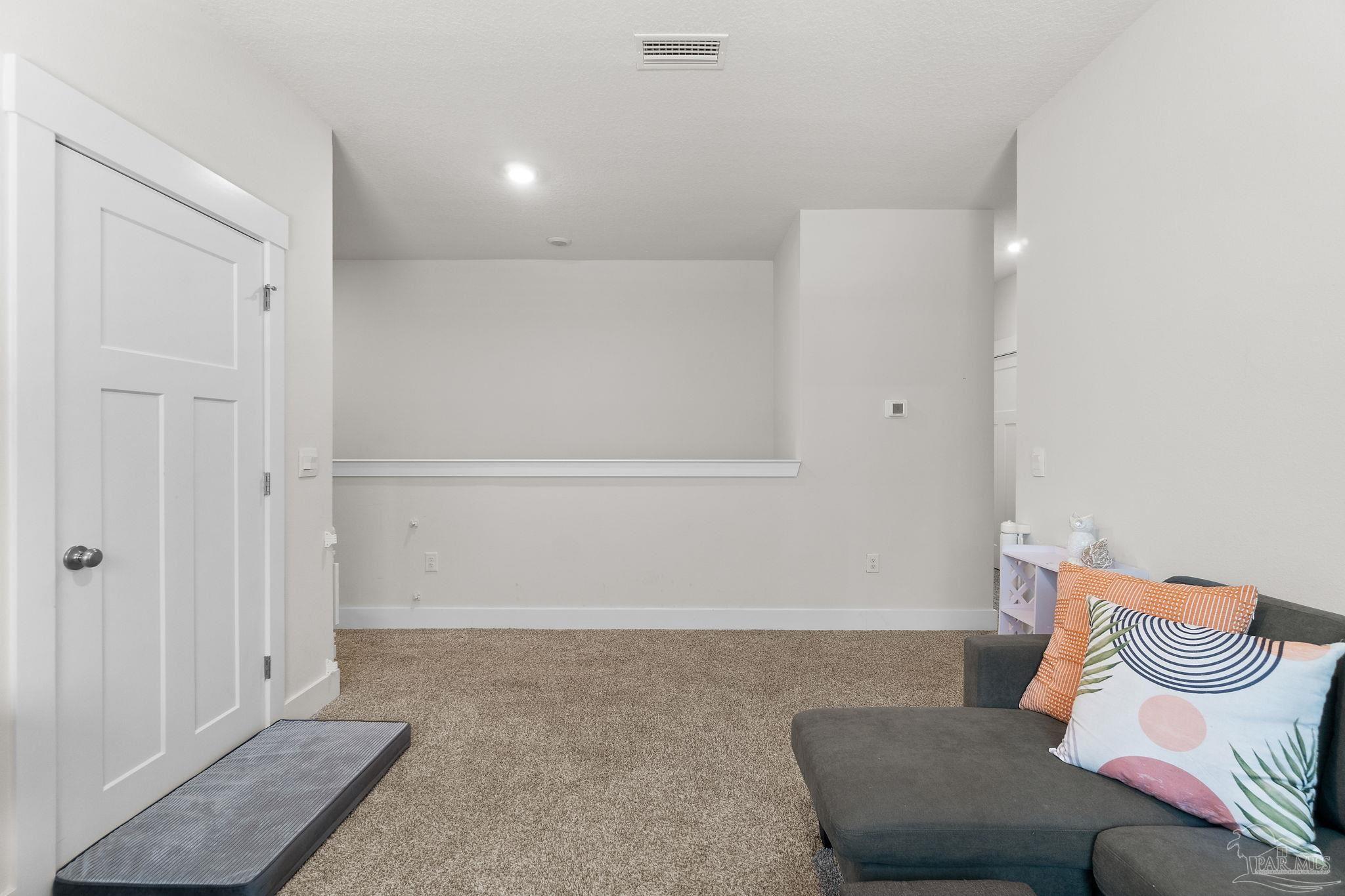 6060 Rutherford Loop Pensacola, FL 32526 - Photo 16 of 30 a living room with furniture and a gate