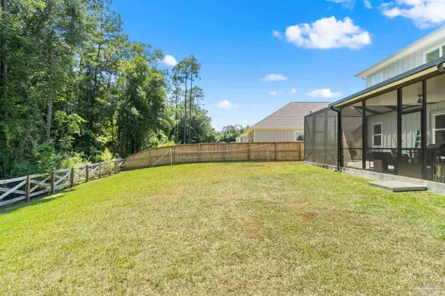 a swimming pool with yard