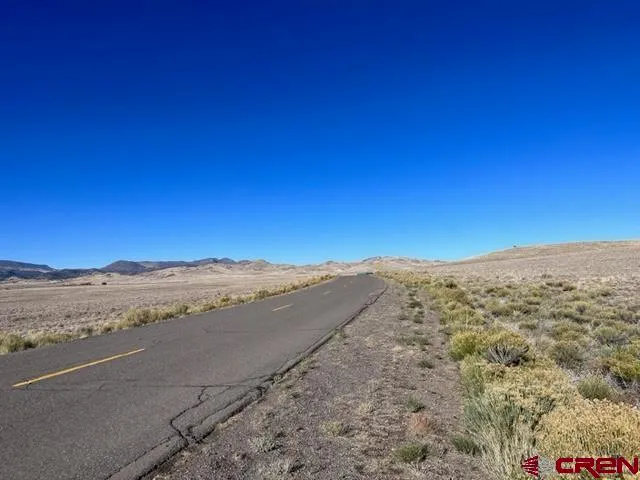 a view of ocean and mountain