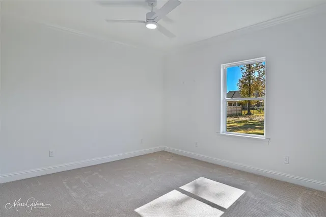a bathroom with a toilet a bath tub and a shower