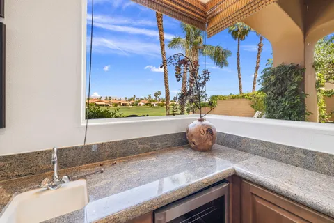 a kitchen with stainless steel appliances a stove and a refrigerator