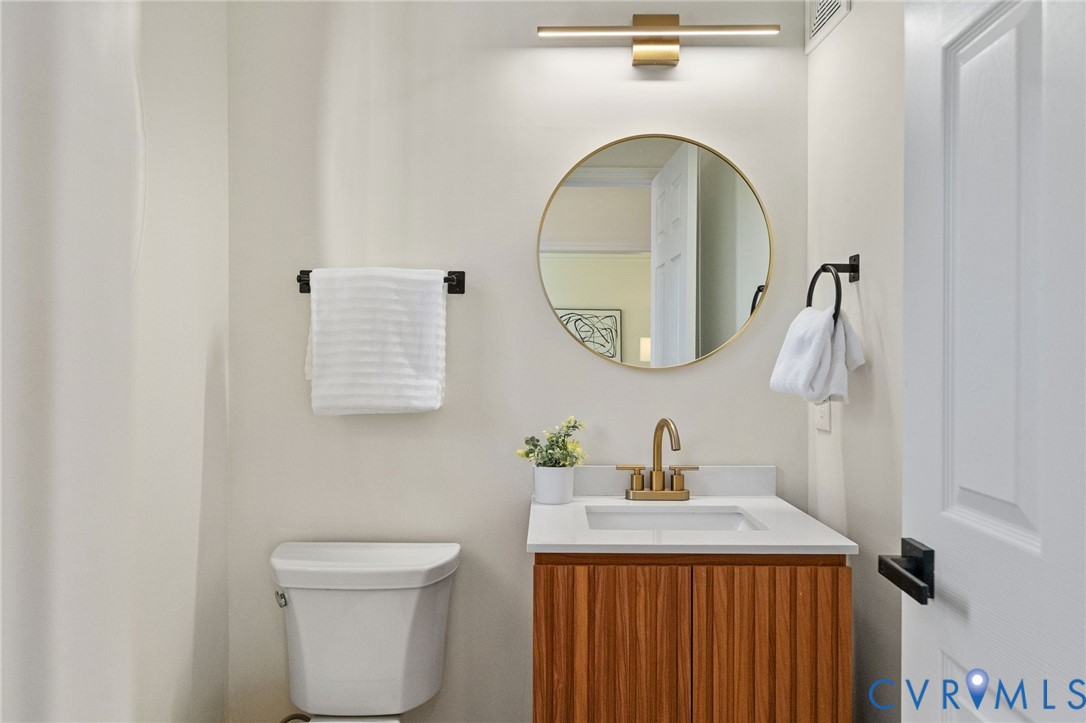 14200 Princess Mary Road Chesterfield, VA 23838 - Photo 40 of 83 a bathroom with a sink and a mirror