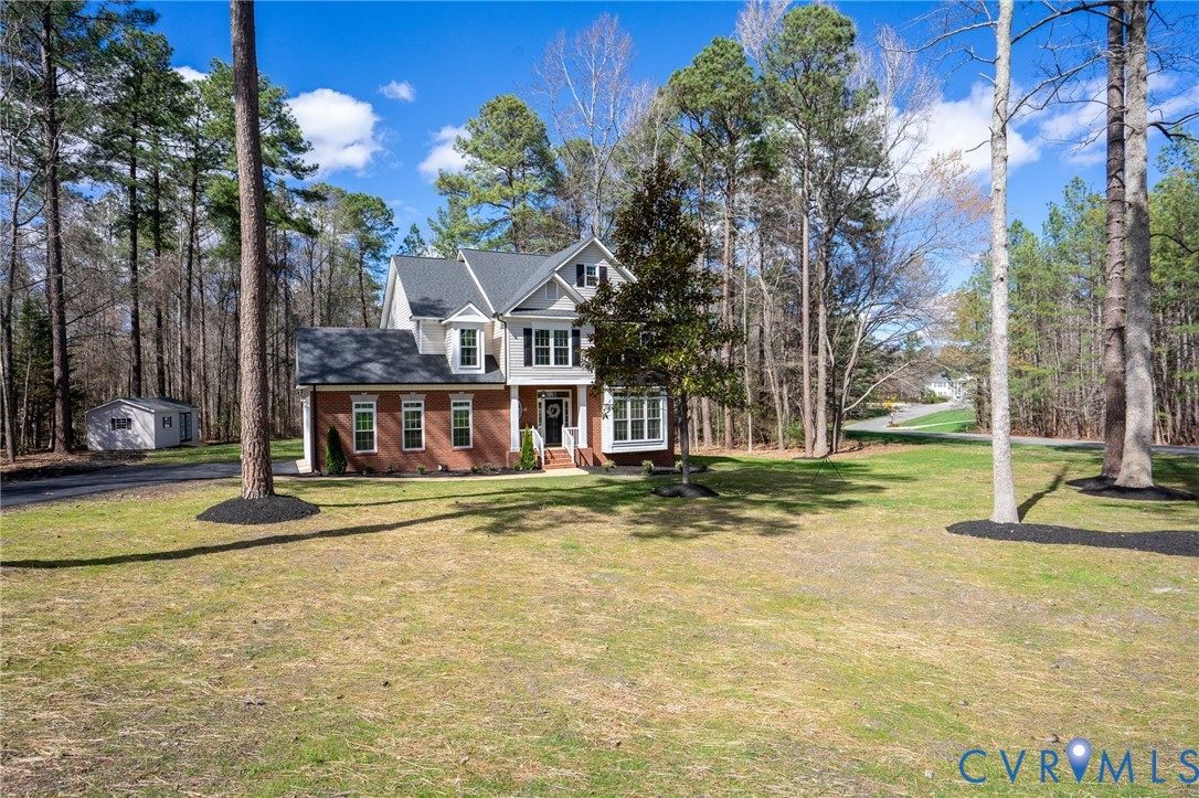 14200 Princess Mary Road Chesterfield, VA 23838 - Photo 4 of 83 a view of a house with a yard and sitting area