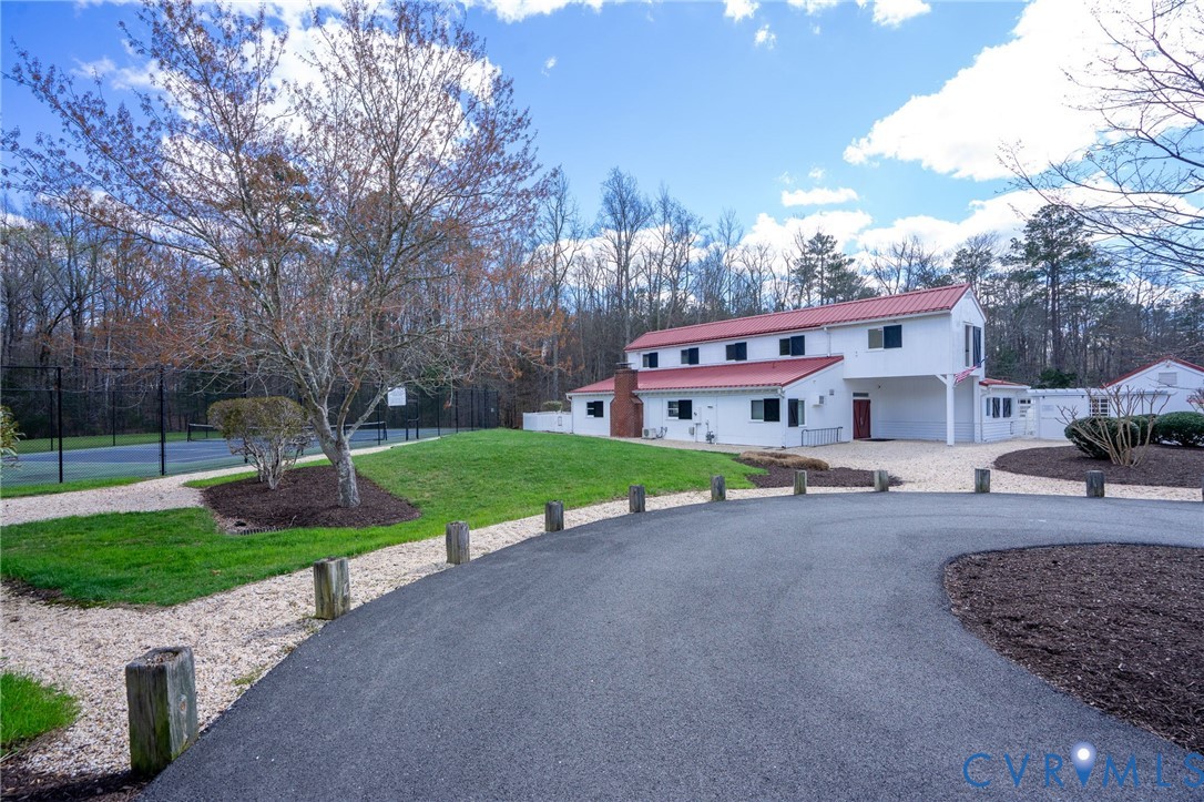 14200 Princess Mary Road Chesterfield, VA 23838 - Photo 66 of 83 a view of a house with a yard and sitting area