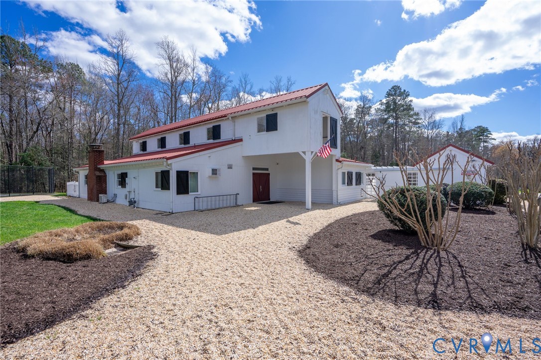 14200 Princess Mary Road Chesterfield, VA 23838 - Photo 67 of 83 a view of a house with a yard