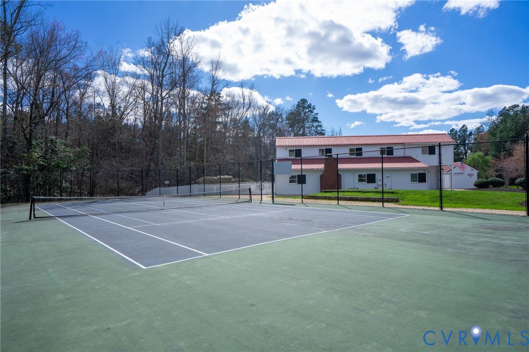 14200 Princess Mary Road Chesterfield, VA 23838 - Photo 70 of 83 a view of a tennis ground with large trees