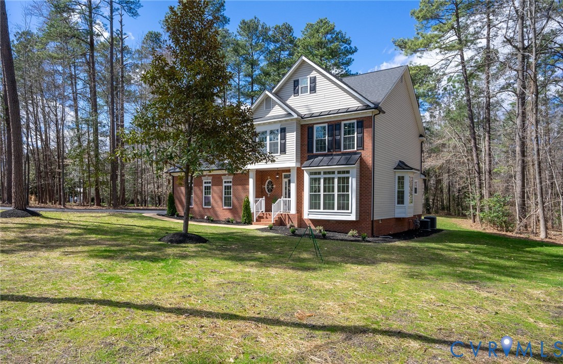 14200 Princess Mary Road Chesterfield, VA 23838 - Photo 7 of 83 a view of a house with a yard