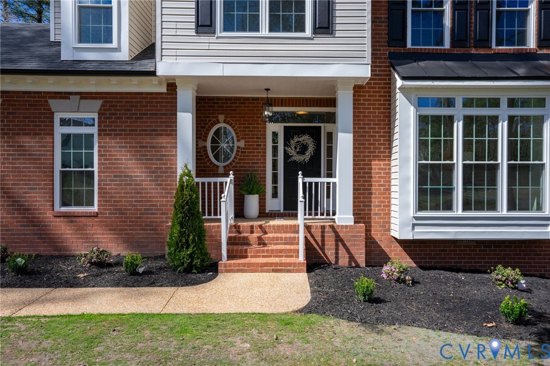 14200 Princess Mary Road Chesterfield, VA 23838 - Photo 10 of 83 a front view of a house with garden