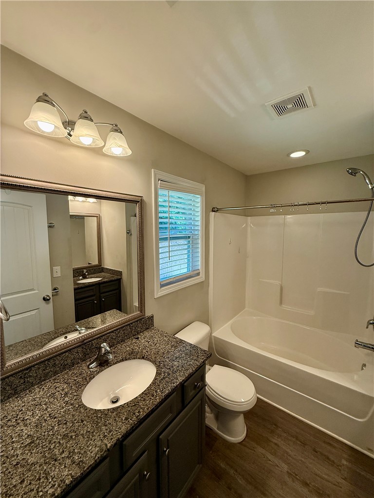 417 Laurel Grove Court Seneca, SC 29678 - Photo 7 of 10 A well-appointed bath features a deep soaking tub and a vanity with granite counters.