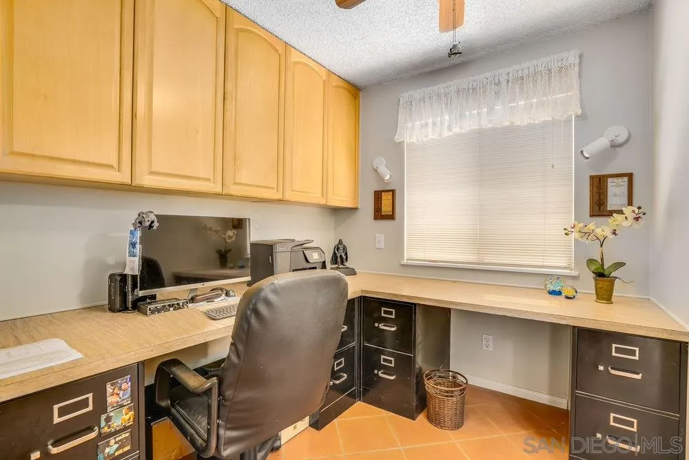 9468 Domer Road Santee, CA 92071 - Photo 12 of 25 a room with a chair and appliances