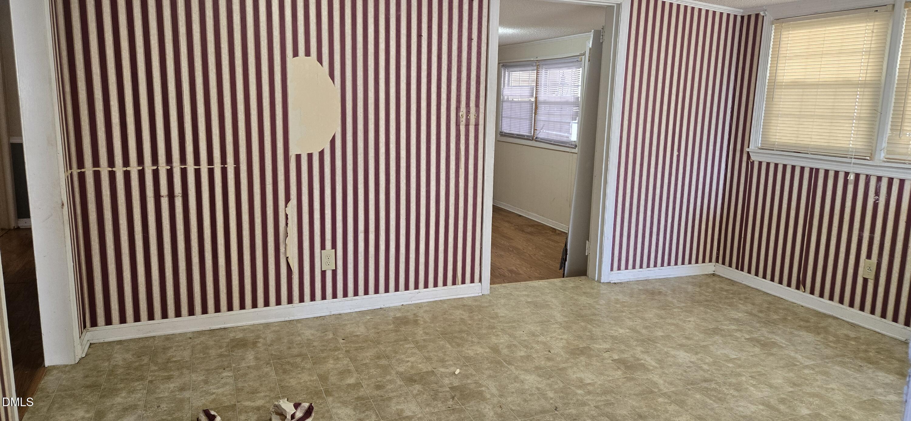 480 5 Bridge Road Clinton, NC 28328 - Photo 13 of 23 a view of a livingroom with a floor to ceiling window