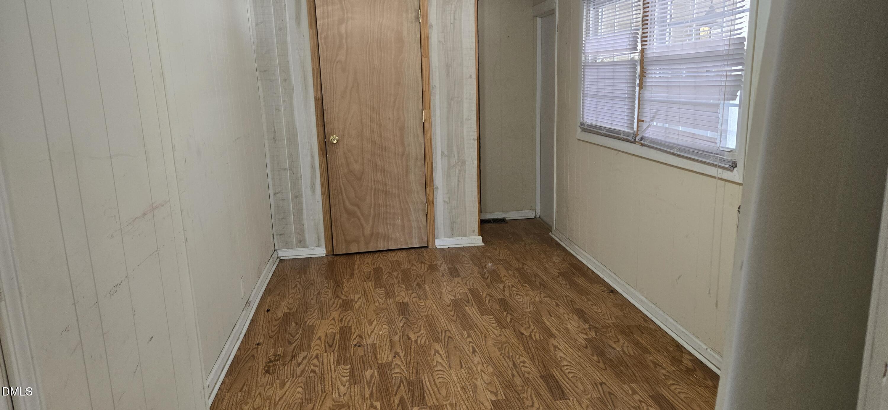 480 5 Bridge Road Clinton, NC 28328 - Photo 17 of 23 a view of a small space with wooden floor and a window