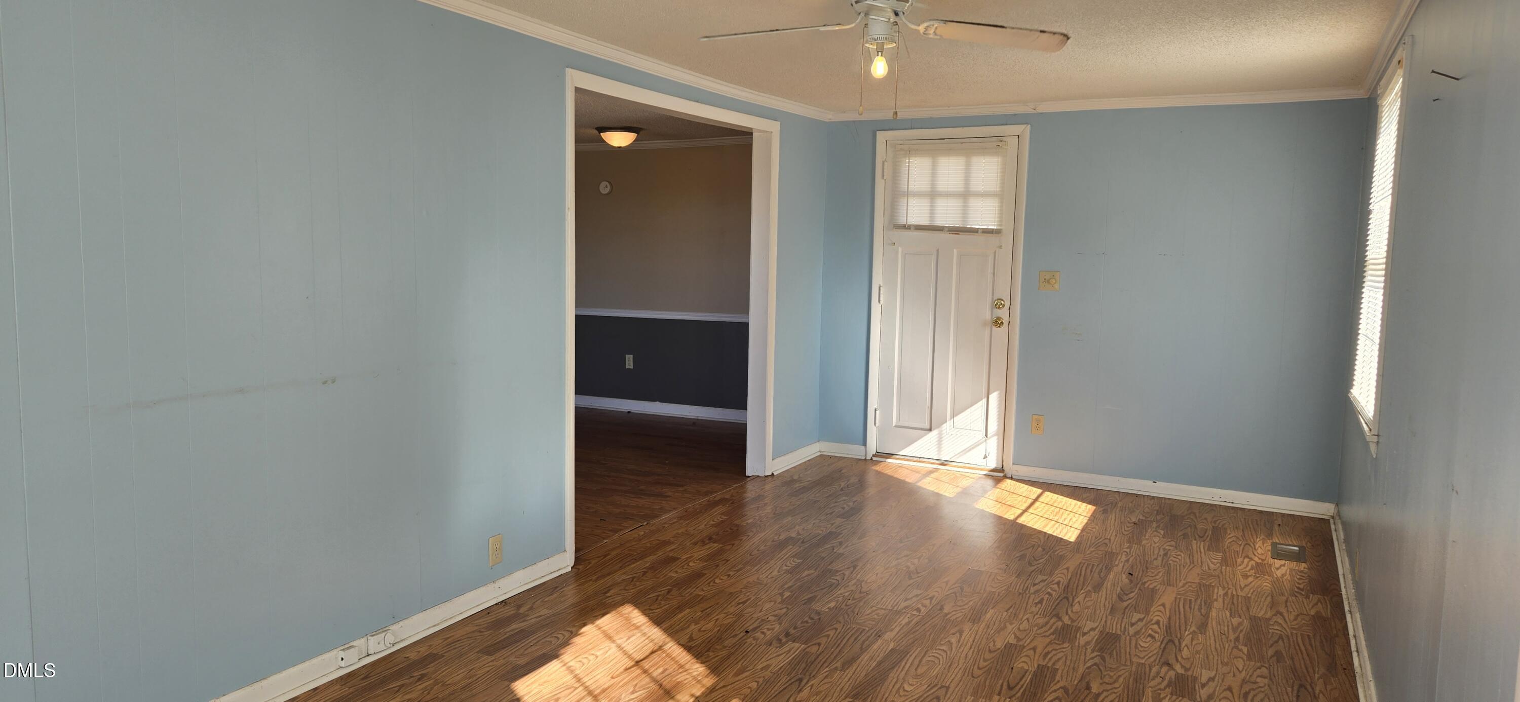480 5 Bridge Road Clinton, NC 28328 - Photo 10 of 23 an empty room with wooden floor & windows