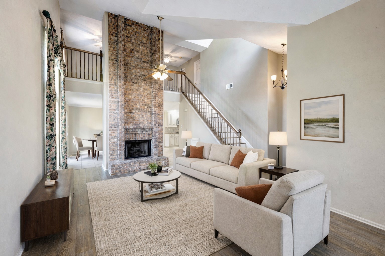 10222 Crooks Way Court Houston, TX 77065 - Photo 2 of 27 Bright and spacious living room featuring soaring ceilings and a cozy fireplace.Virtually furnished.