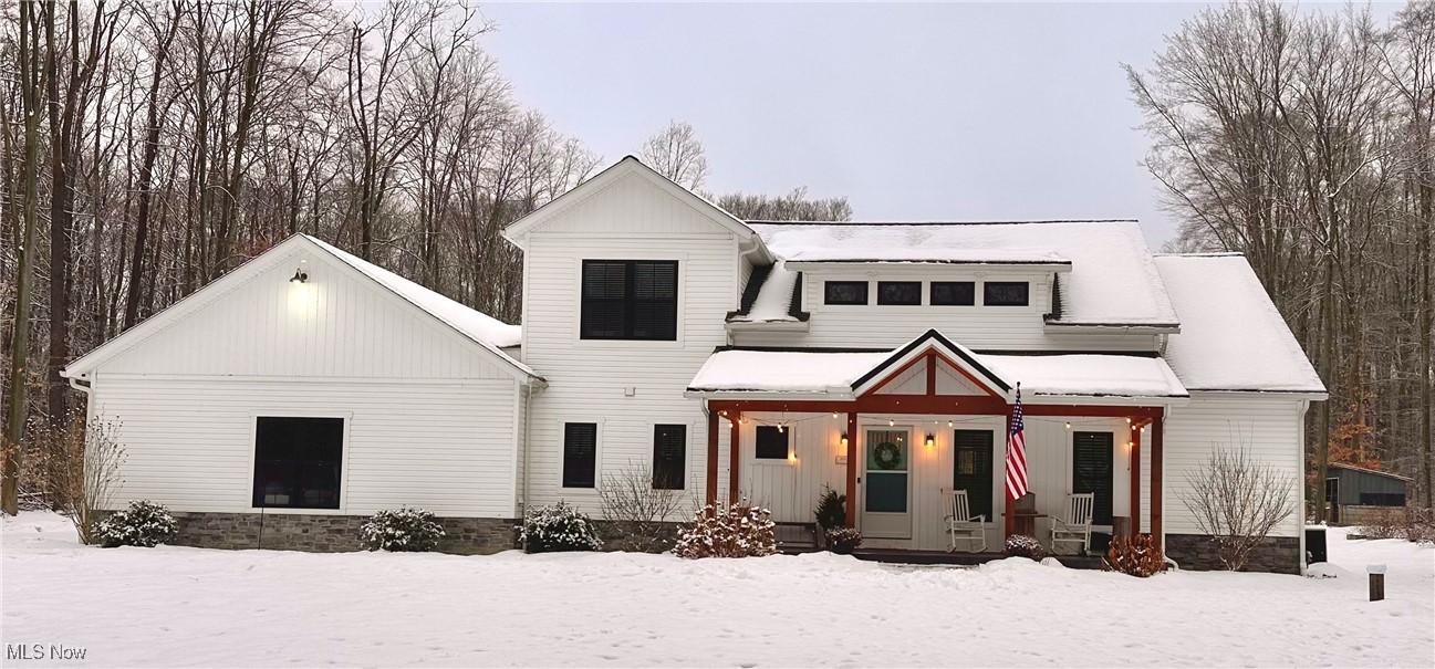 800 Crackel Road Aurora, OH 44202 - Photo 1 of 1 View of front of home featuring covered porch