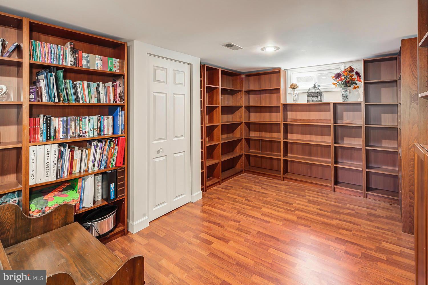 12304 Middle Road Silver Spring, MD 20906 - Photo 22 of 30 a view of a room with empty shelves