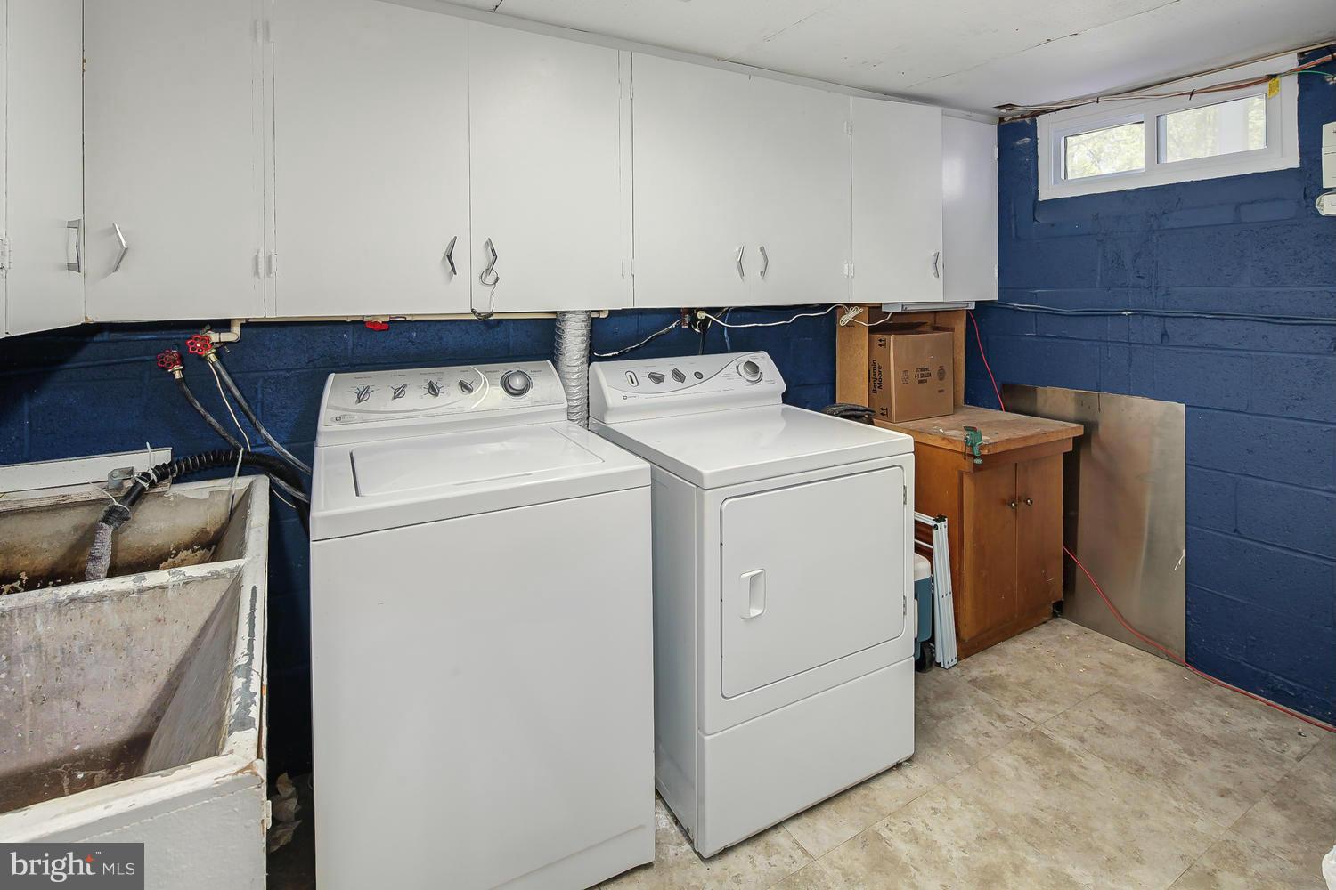 12304 Middle Road Silver Spring, MD 20906 - Photo 26 of 30 a utility room with dryer and washer