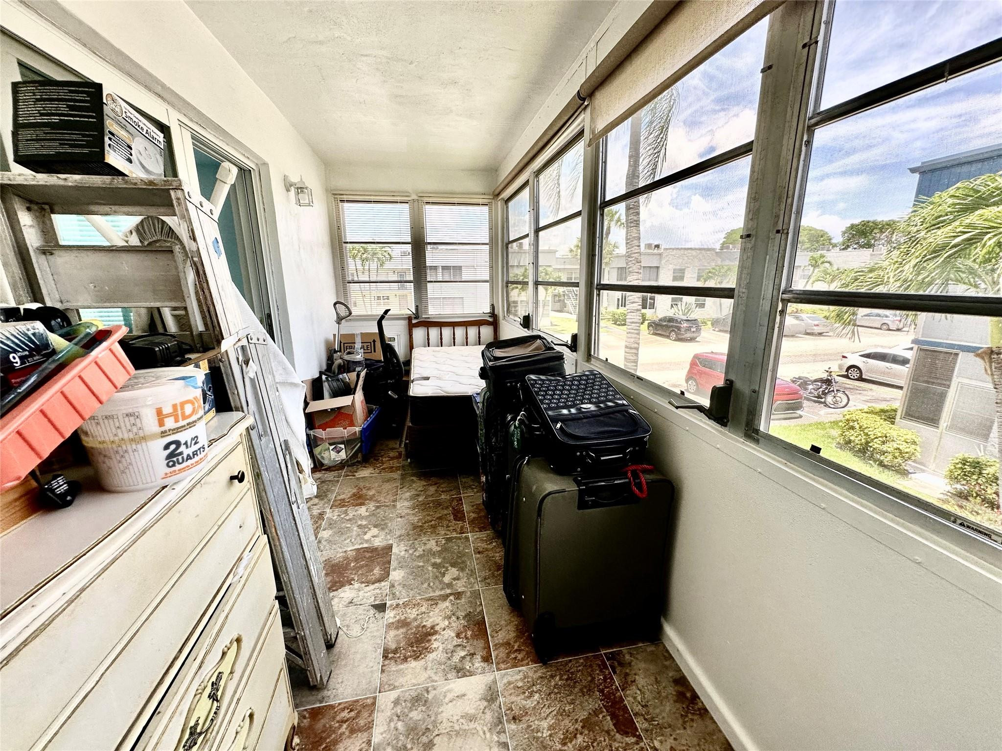 710 Flanders O, Unit 710 Delray Beach, FL 33484 - Photo 24 of 37 Glass enclosed Patio