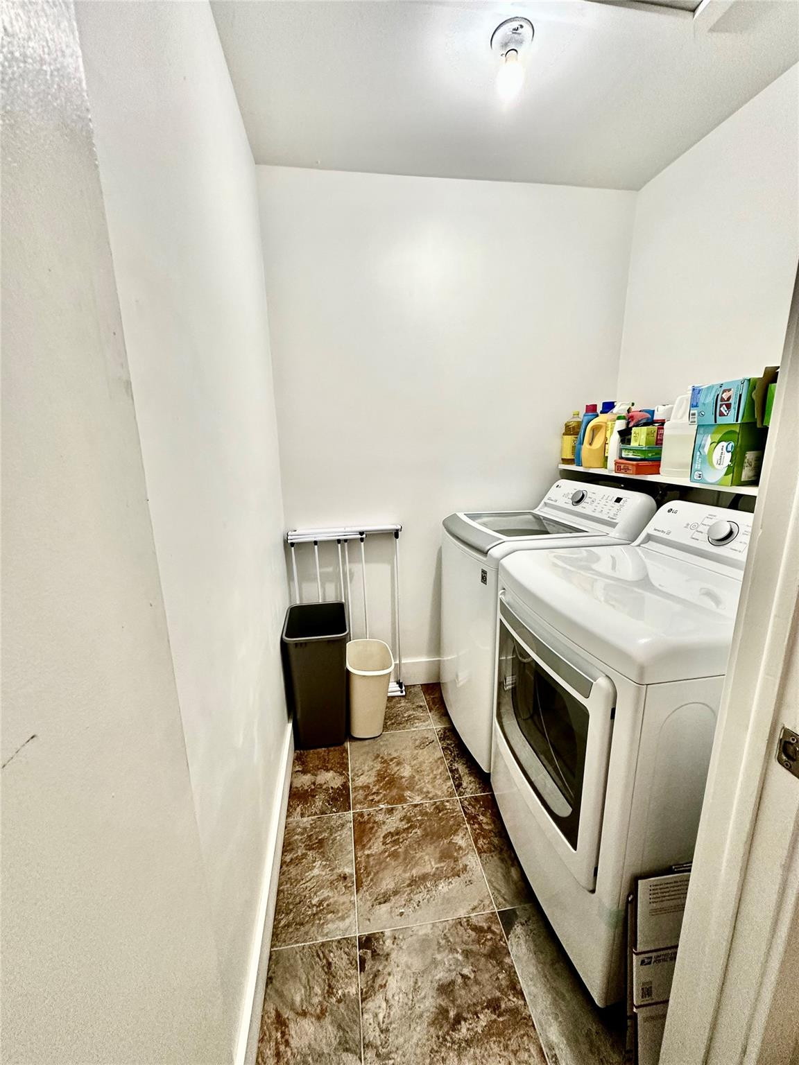 710 Flanders O, Unit 710 Delray Beach, FL 33484 - Photo 26 of 37 Washer/Dryer and storage