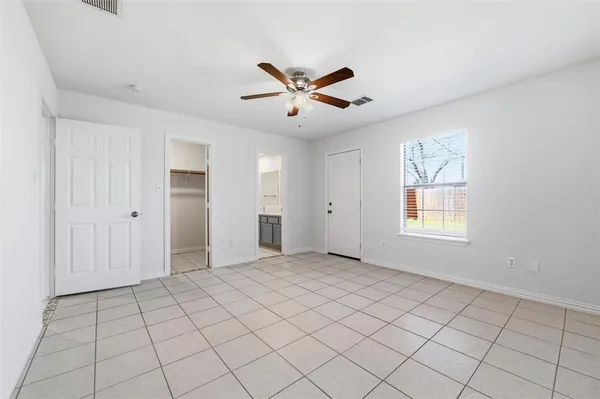 a view of an empty room with window