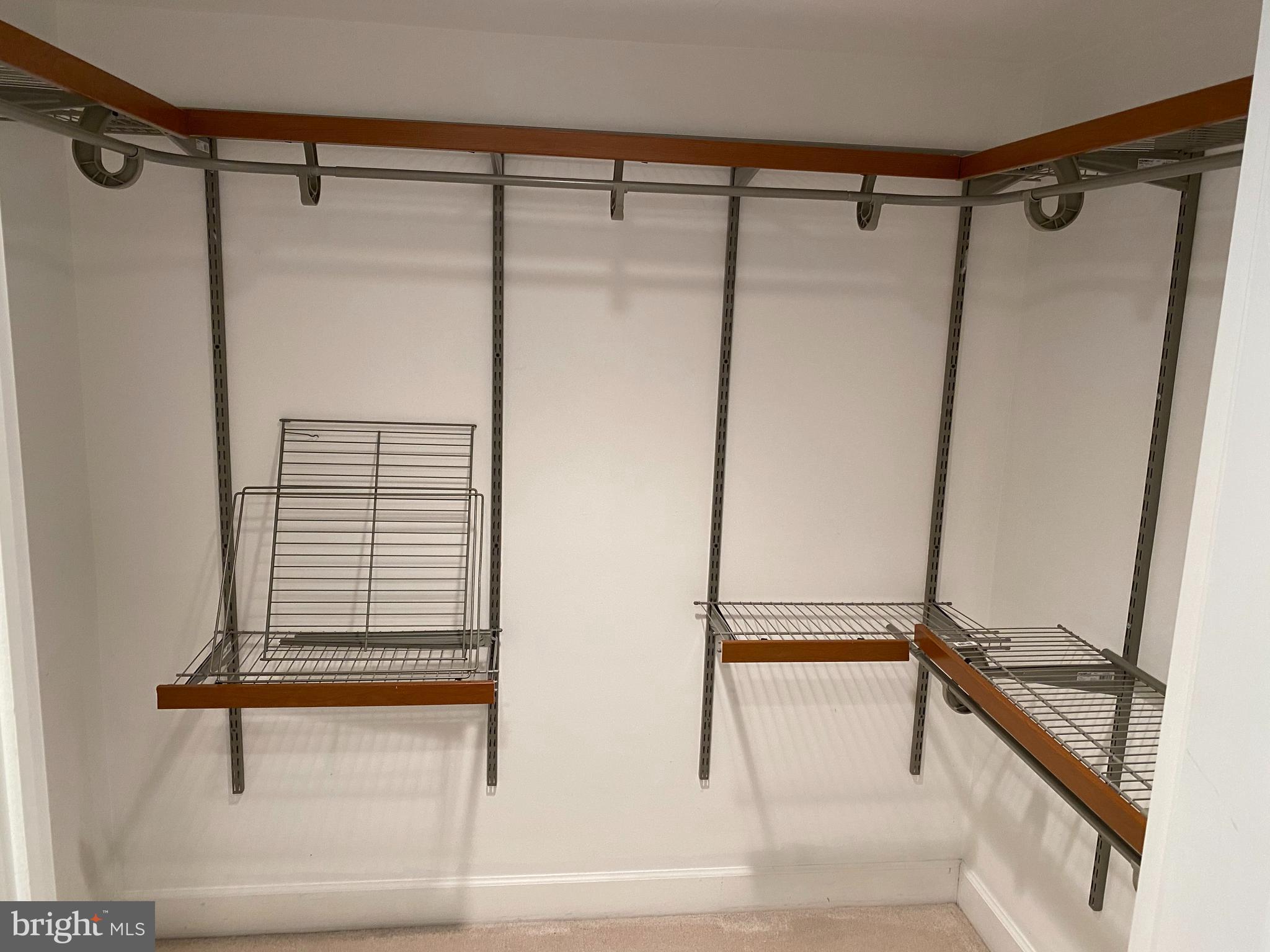 11800 Sunset Hills Road, Unit 313 Reston, VA 20190 - Photo 31 of 60 Primary bedroom walk-in closet