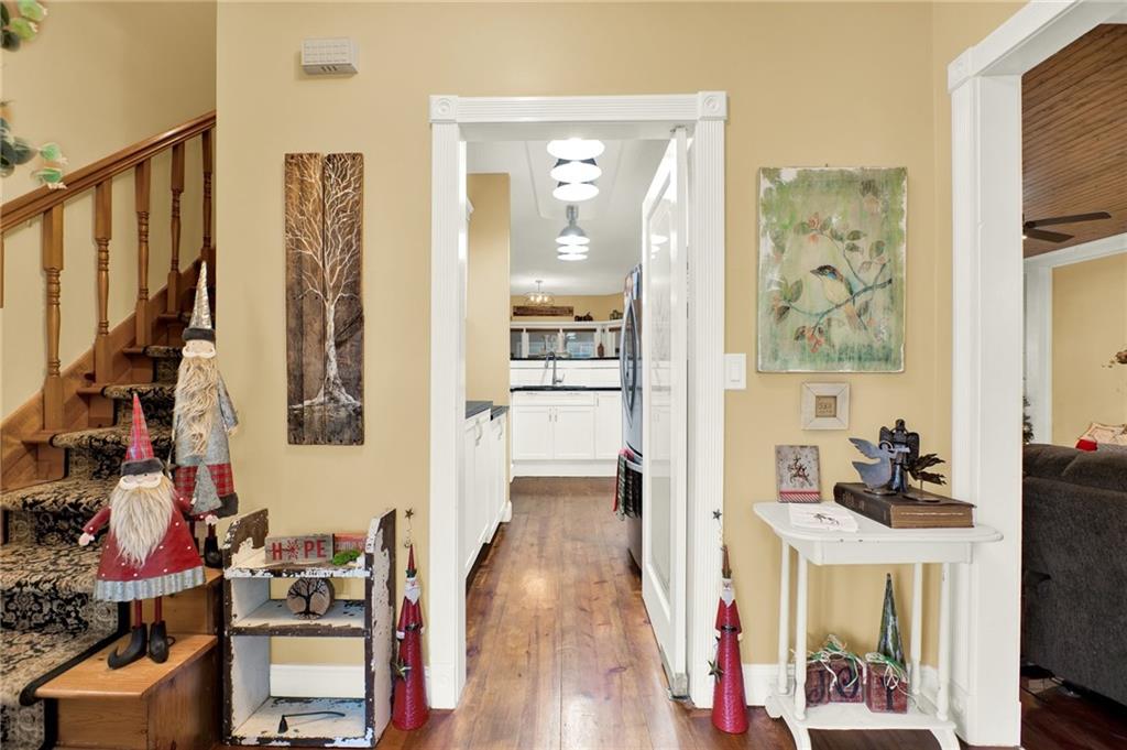 1050 Robinson Road Dahlonega, GA 30533 - Photo 11 of 28 a view of a hallway with workspace and a living room