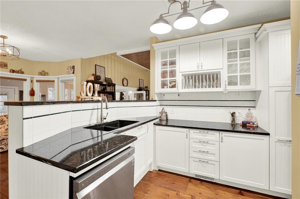 1050 Robinson Road Dahlonega, GA 30533 - Photo 14 of 28 a kitchen with stainless steel appliances granite countertop a stove and a sink