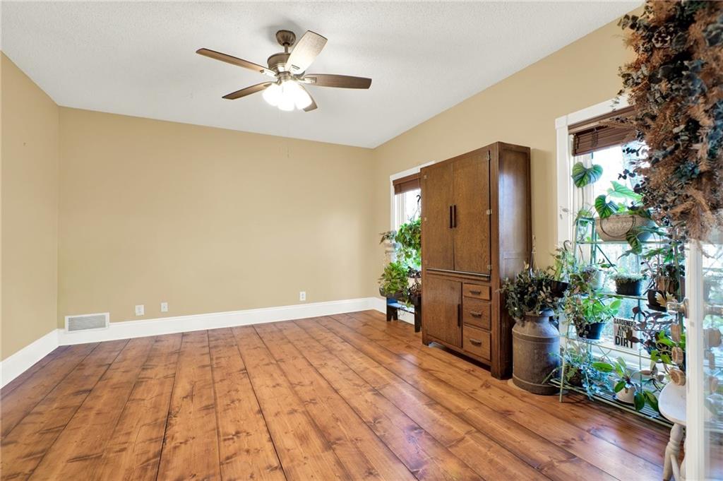 1050 Robinson Road Dahlonega, GA 30533 - Photo 19 of 28 a view of an empty room with a potted plant