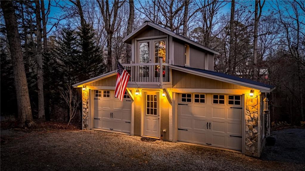 1050 Robinson Road Dahlonega, GA 30533 - Photo 26 of 28 a front view of a house with garage