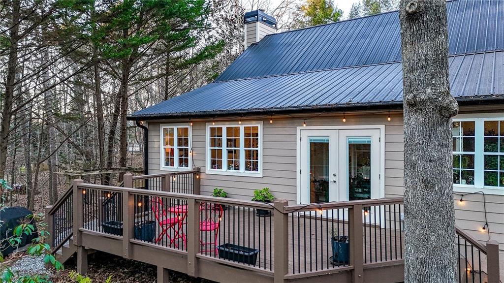 1050 Robinson Road Dahlonega, GA 30533 - Photo 7 of 28 a view of a house with a wooden fence