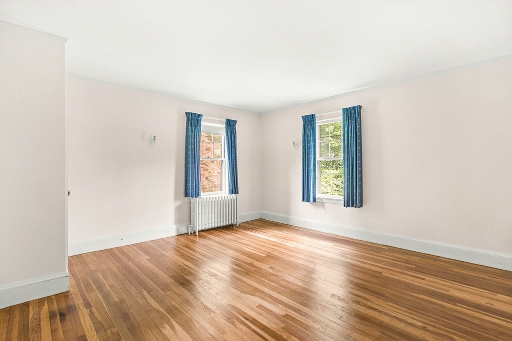 30 Rangeley Road Winchester, MA 01890 - Photo 26 of 42 a view of an empty room with wooden floor and a window