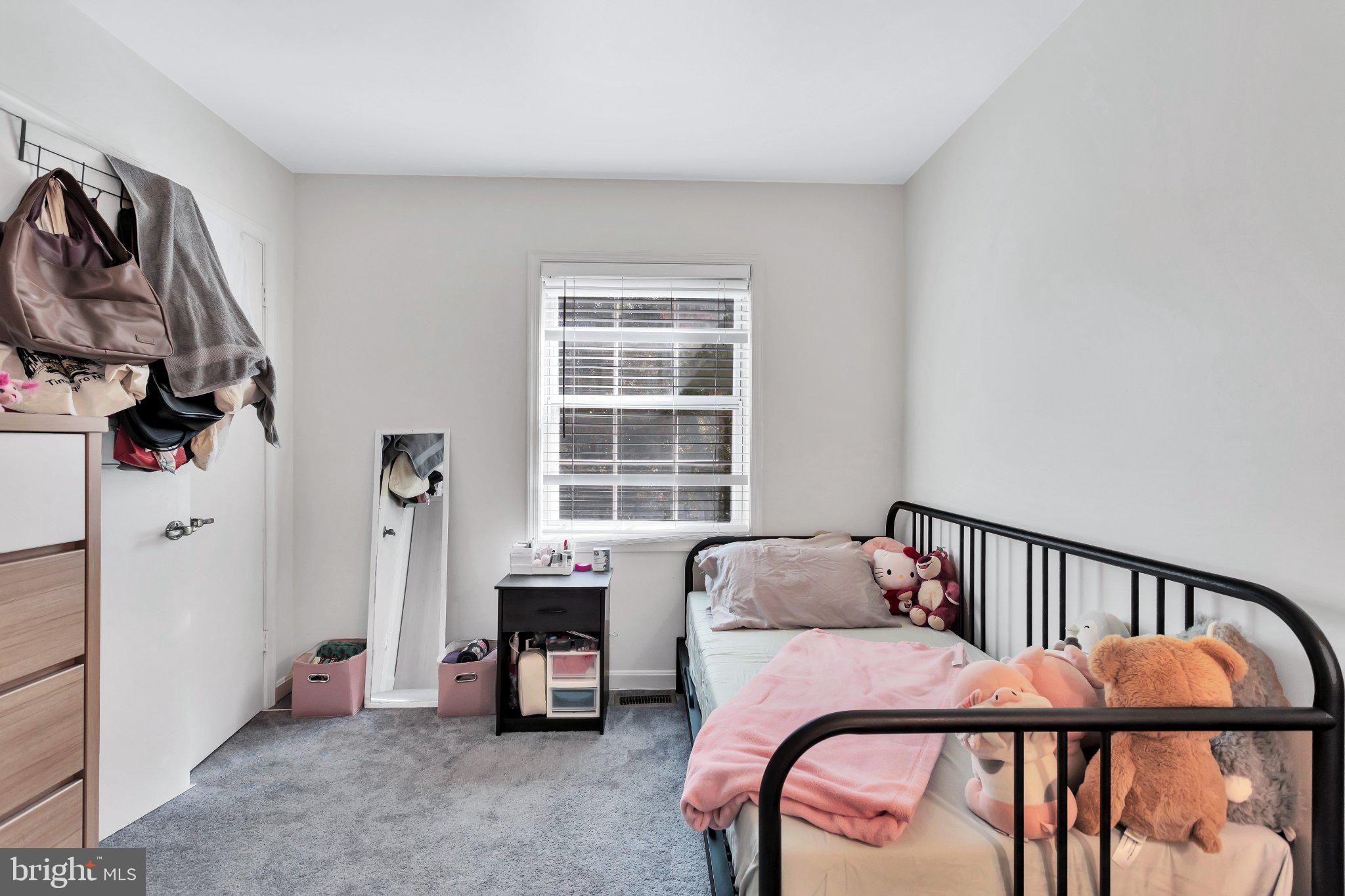 9009 Sweet Birch Court Springfield, VA 22152 - Photo 17 of 34 Cozy bedroom with natural light.