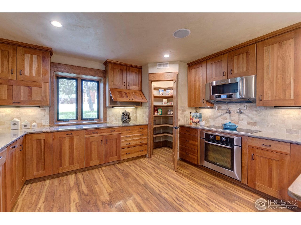 2304 West Prospect Road Fort Collins, CO 80526 - Photo 6 of 39 Two potfillers above the stove